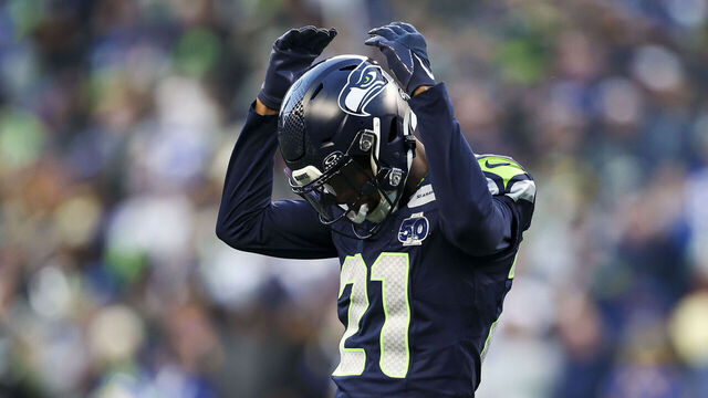 SEATTLE, WASHINGTON - JANUARY 25: Devon Witherspoon #21 of the Seattle Seahawks pumps up the crowd during the NFC Championship NFL football game against the Los Angeles Rams at Lumen Field on January 25, 2026 in Seattle, Washington.
