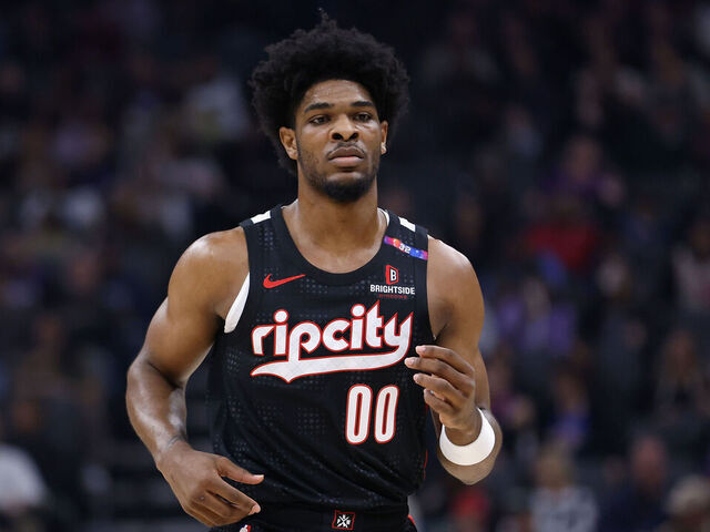 SACRAMENTO, CALIFORNIA - MARCH 27: Scoot Henderson #00 of the Portland Trail Blazers looks on in the first quarter against the Sacramento Kings at Golden 1 Center on March 27, 2025 in Sacramento, California.