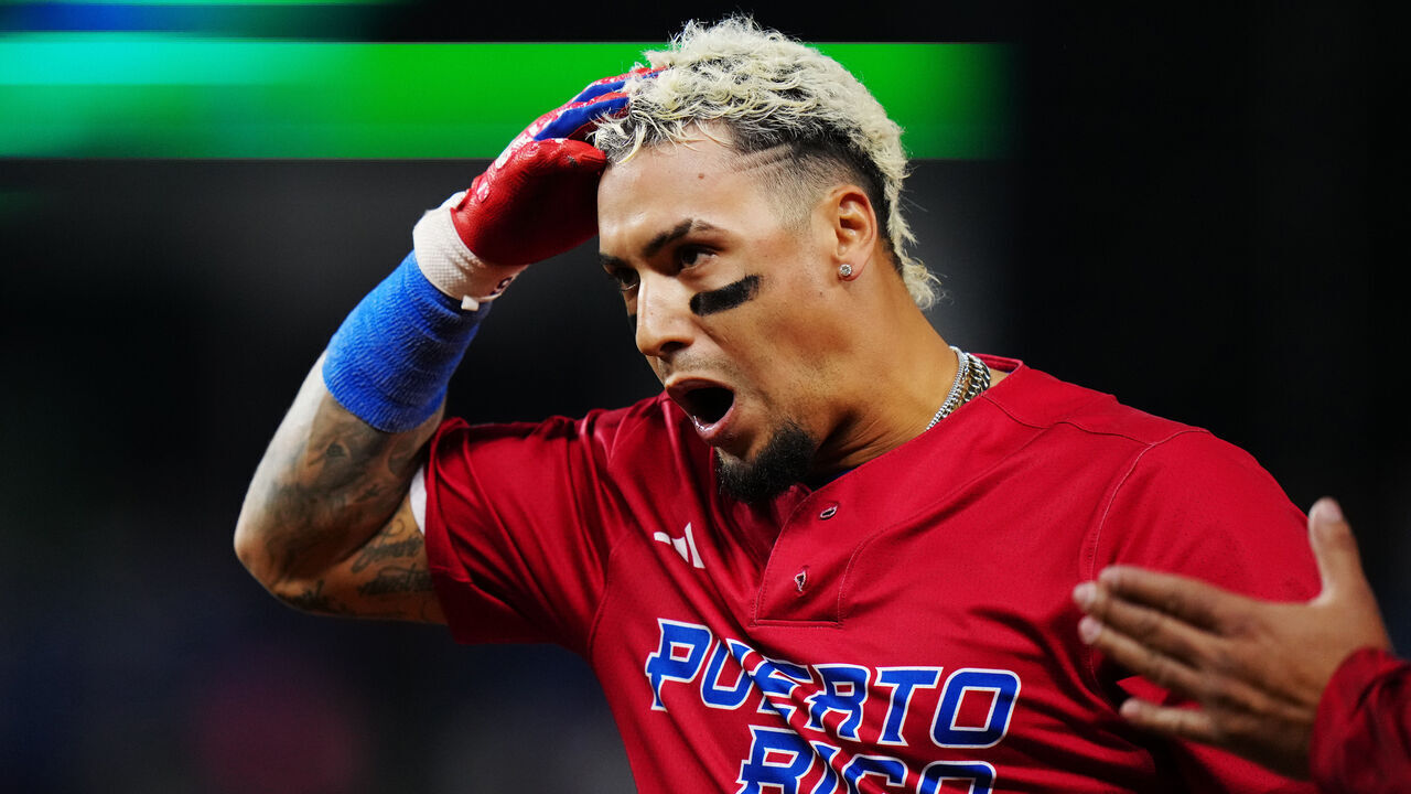 PHOENIX, AZ - MARCH 17: Javier Báez #9 of Team Puerto Rico reacts after hitting a single in the eighth inning during the 2023 World Baseball Classic Quarterfinal game between Team Puerto Rico and Team Mexico at loanDepot Park on Friday, March 17, 2023 in Miami, Florida.