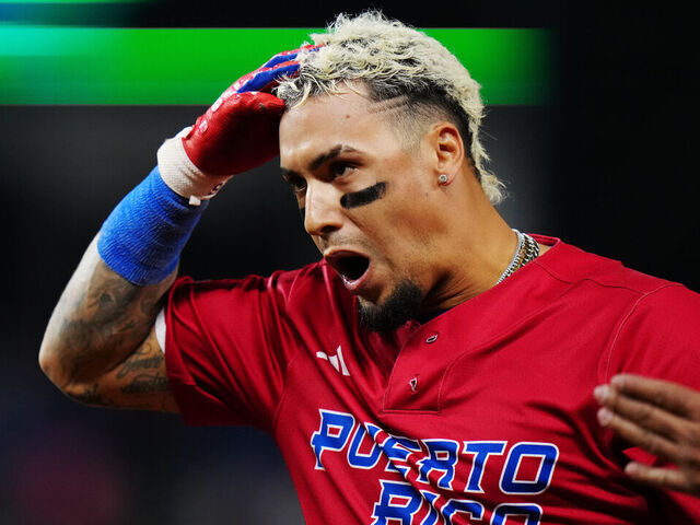 PHOENIX, AZ - MARCH 17: Javier Báez #9 of Team Puerto Rico reacts after hitting a single in the eighth inning during the 2023 World Baseball Classic Quarterfinal game between Team Puerto Rico and Team Mexico at loanDepot Park on Friday, March 17, 2023 in Miami, Florida.