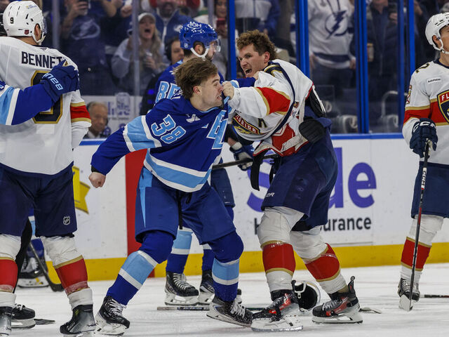 TAMPA, FL - FEBRUARY 5: Brandon Hagel #38 of the Tampa Bay Lightning fights against Matthew Tkachuk #19 of the Florida Panthers at Benchmark International Arena on February 5, 2026 in Tampa, Florida.