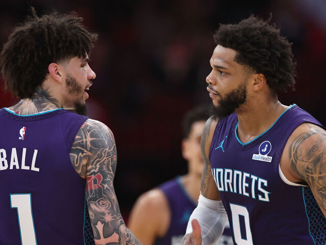 HOUSTON, TEXAS - FEBRUARY 05: Miles Bridges #0 of the Charlotte Hornets celebrates his three-pointer with LaMelo Ball #1 in the first half against the Houston Rockets at Toyota Center on February 05, 2026 in Houston, Texas.