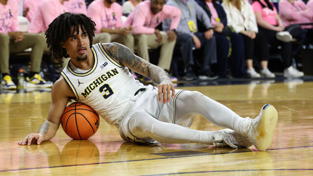 ANN ARBOR, MI - FEBRUARY 05: Michigan Wolverines guard Elliot Cadeau (3) looks on while lying on the court after scrambling for a loose ball during the second half of a regular season Big Ten Conference college basketball game between the Penn State Nittany Lions and the Michigan Wolverines on February 5, 2026 at the Crisler Center in Ann Arbor, Michigan.