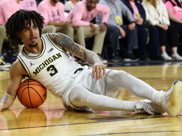 ANN ARBOR, MI - FEBRUARY 05: Michigan Wolverines guard Elliot Cadeau (3) looks on while lying on the court after scrambling for a loose ball during the second half of a regular season Big Ten Conference college basketball game between the Penn State Nittany Lions and the Michigan Wolverines on February 5, 2026 at the Crisler Center in Ann Arbor, Michigan.