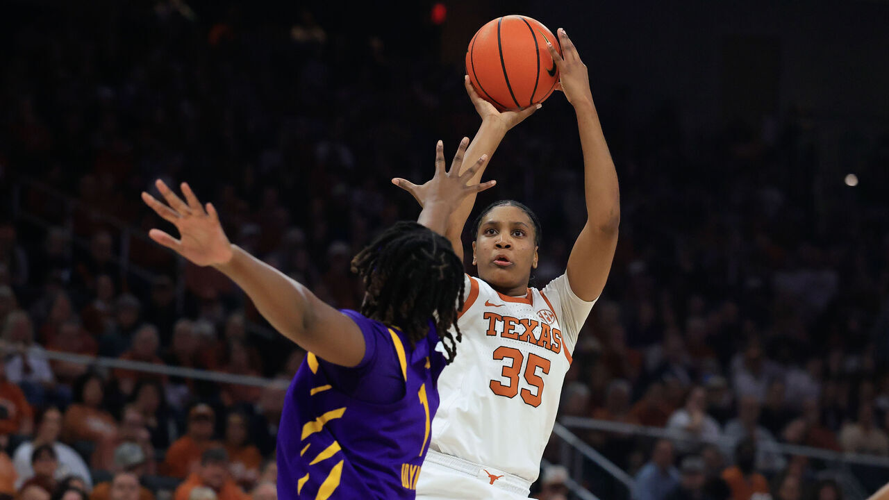 AUSTIN, TX - FEBRUARY 05: Texas Longhorns forward Madison Booker (35) takes a shot over Louisiana State Tigers forward Amiya Joyner (1) during the game on February 05, 2026, at the Moody Center in Austin, TX.