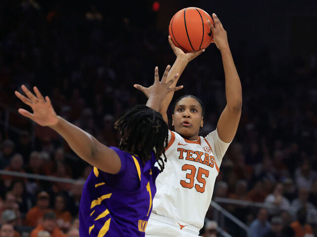 AUSTIN, TX - FEBRUARY 05: Texas Longhorns forward Madison Booker (35) takes a shot over Louisiana State Tigers forward Amiya Joyner (1) during the game on February 05, 2026, at the Moody Center in Austin, TX.
