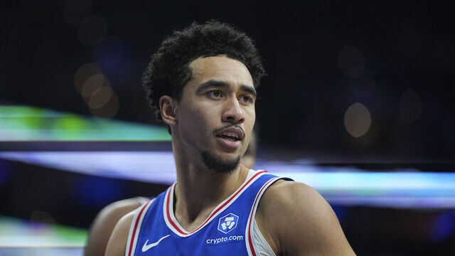 PHILADELPHIA, PENNSYLVANIA - JANUARY 29: Jared McCain #20 of the Philadelphia 76ers looks on against the Sacramento Kings at Xfinity Mobile Arena on January 29, 2026 in Philadelphia, Pennsylvania. The 76ers defeated the Kings 113-111.