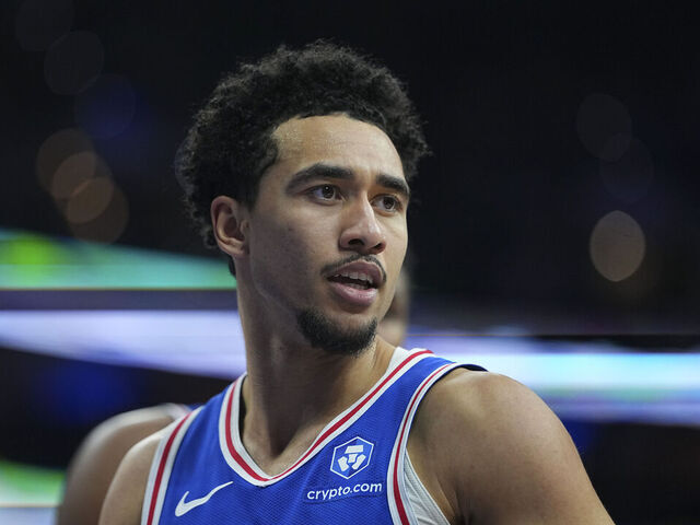 PHILADELPHIA, PENNSYLVANIA - JANUARY 29: Jared McCain #20 of the Philadelphia 76ers looks on against the Sacramento Kings at Xfinity Mobile Arena on January 29, 2026 in Philadelphia, Pennsylvania. The 76ers defeated the Kings 113-111.