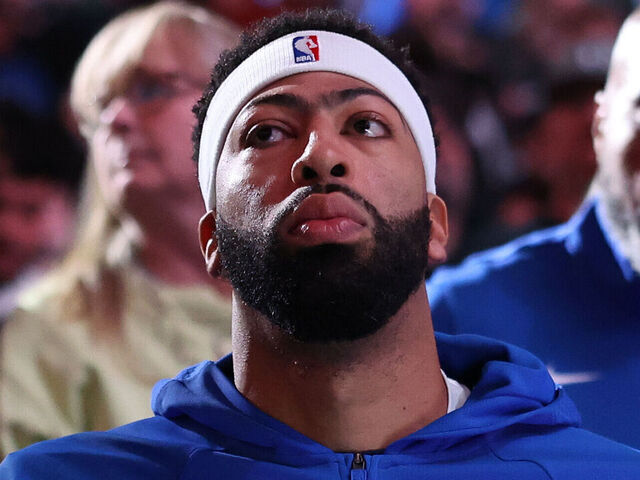 DALLAS, TEXAS - JANUARY 01: Anthony Davis #3 of the Dallas Mavericks sits on his team's bench prior to the game against the Philadelphia 76ers at American Airlines Center on January 01, 2026 in Dallas, Texas.
