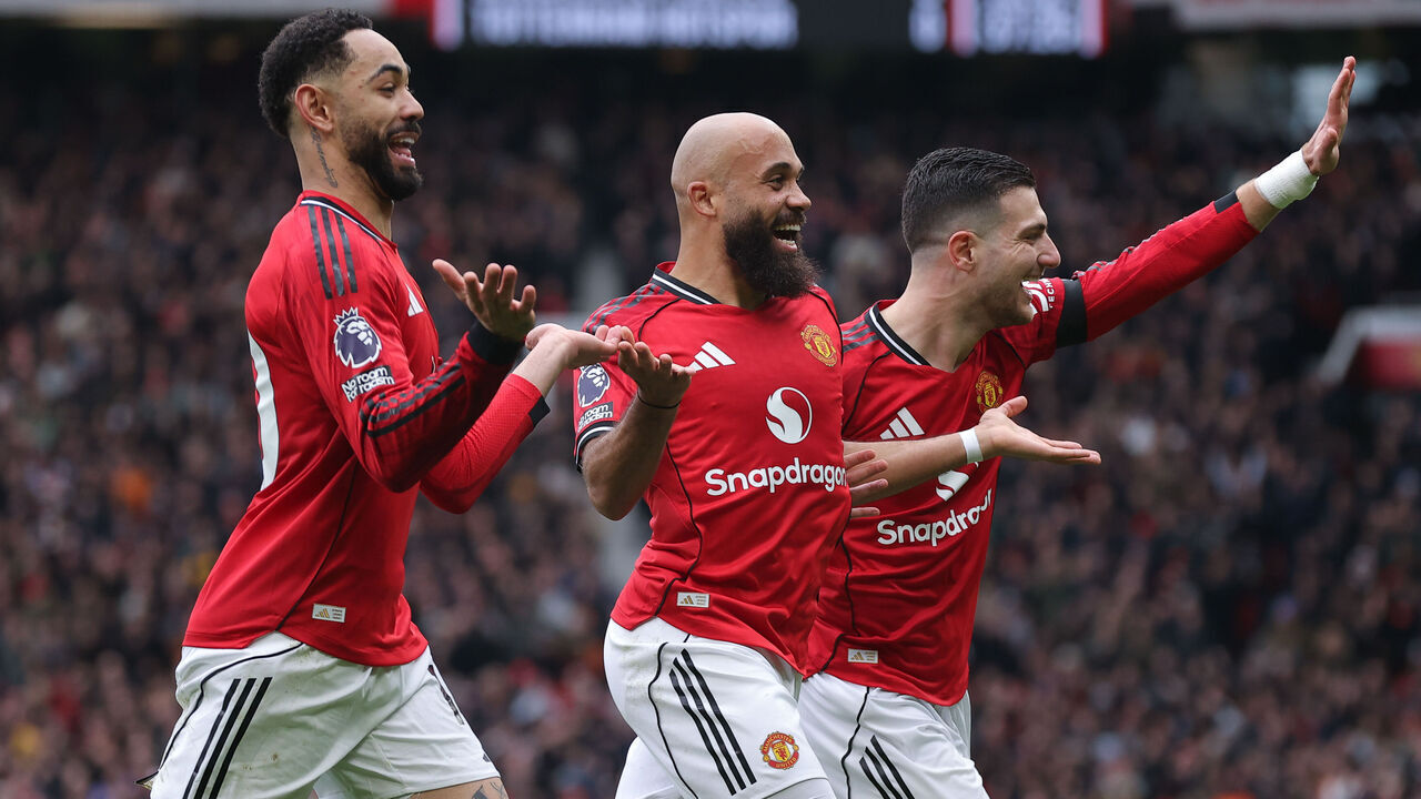 MANCHESTER, ENGLAND - FEBRUARY 07: Bryan Mbeumo of Manchester United celebrates after scoring their side's first goal during the Premier League match between Manchester United and Tottenham Hotspur at Old Trafford on February 07, 2026 in Manchester, England.