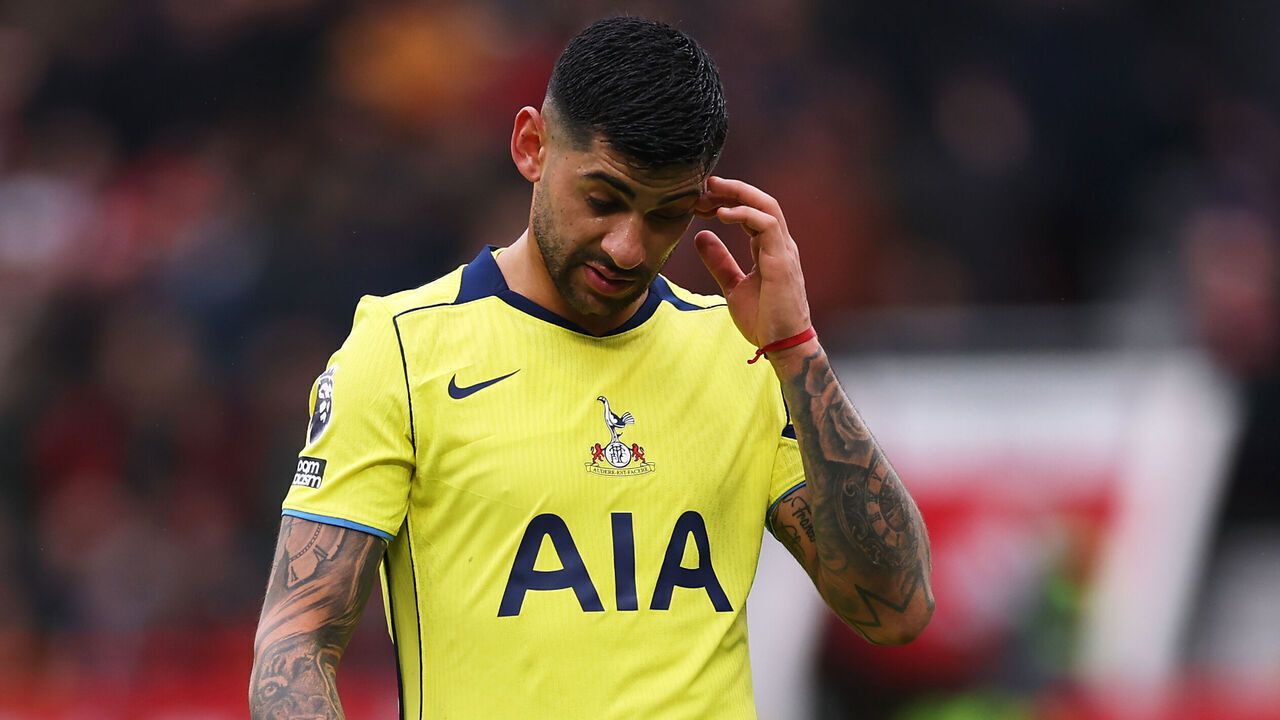 MANCHESTER, ENGLAND - FEBRUARY 07: Cristian Romero of Tottenham Hotspur looks dejected after being shown a red card during the Premier League match between Manchester United and Tottenham Hotspur at Old Trafford on February 07, 2026 in Manchester, England.