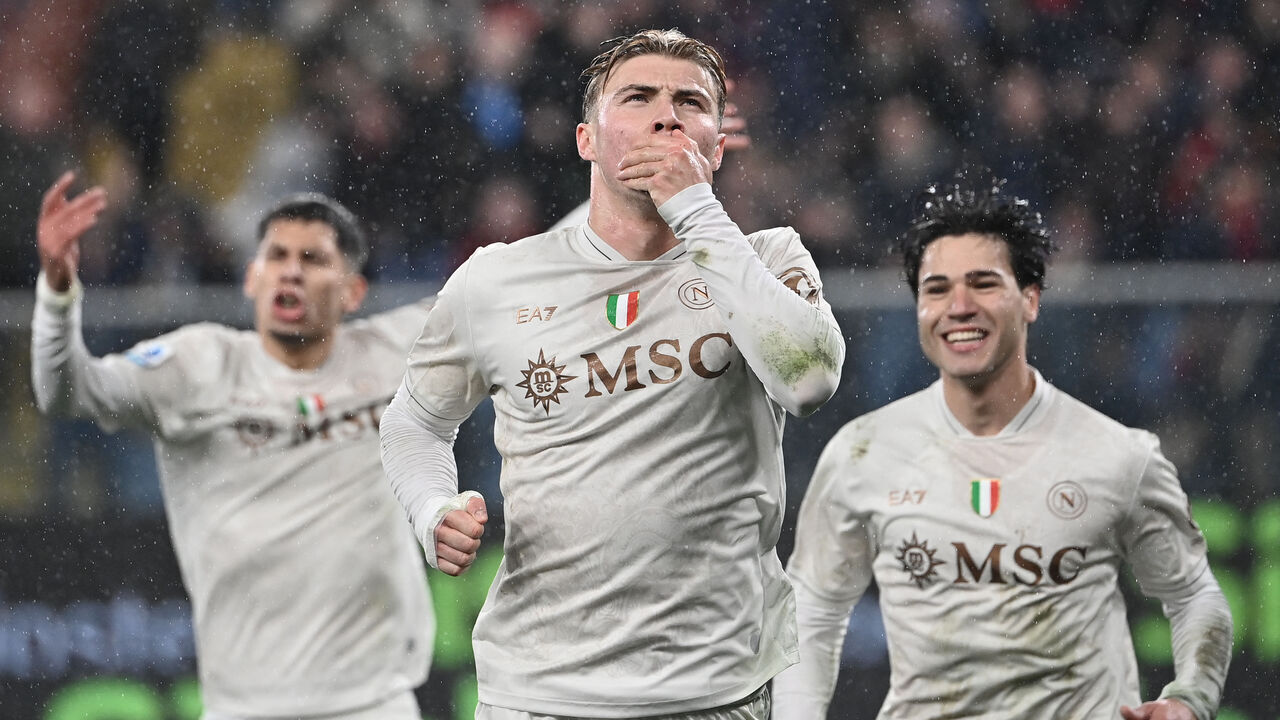 Napoli's Danish forward #19 Rasmus Hojlund celebrates with teammates after scoring a penalty during the Italian Serie A football match between Genoa and Napoli at the Luigi Ferraris stadium in Genoa on February 7, 2026.