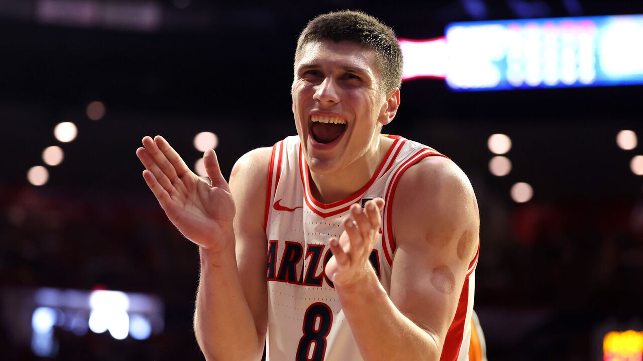 TUCSON, ARIZONA - FEBRUARY 07: Ivan Kharchenkov #8 of the Arizona Wildcats celebrates after a basket against the Oklahoma State Cowboys during the second half at McKale Center on February 07, 2026 in Tucson, Arizona.