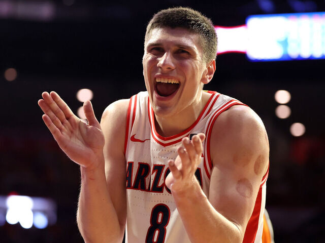 TUCSON, ARIZONA - FEBRUARY 07: Ivan Kharchenkov #8 of the Arizona Wildcats celebrates after a basket against the Oklahoma State Cowboys during the second half at McKale Center on February 07, 2026 in Tucson, Arizona.