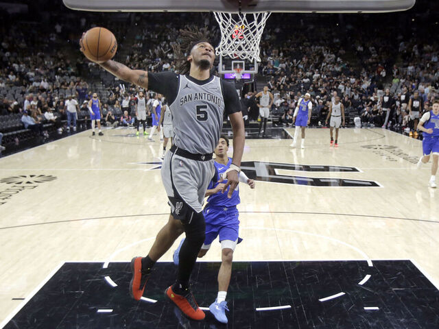 SAN ANTONIO, TX -FEBRUARY 7: Stephon Castle #5 of the San Antonio Spurs drives for two against the Dallas Mavericks in the second half at Frost Bank Center on February 7, 2026 in San Antonio, Texas. NOTE TO USER: User expressly acknowledges and agrees that, by downloading and or using this photograph, User is consenting to terms and conditions of the Getty Images License Agreement.