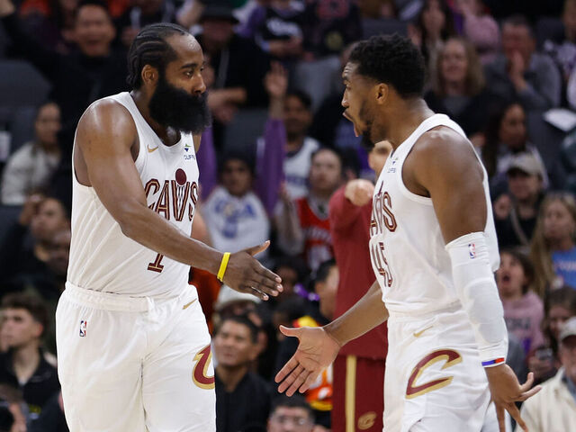 SACRAMENTO, CALIFORNIA - FEBRUARY 07: James Harden #1 of the Cleveland Cavaliers celebrates with Donovan Mitchell #45 after making a three-point shot in the fourth quarter against the Sacramento Kings at Golden 1 Center on February 07, 2026 in Sacramento, California.