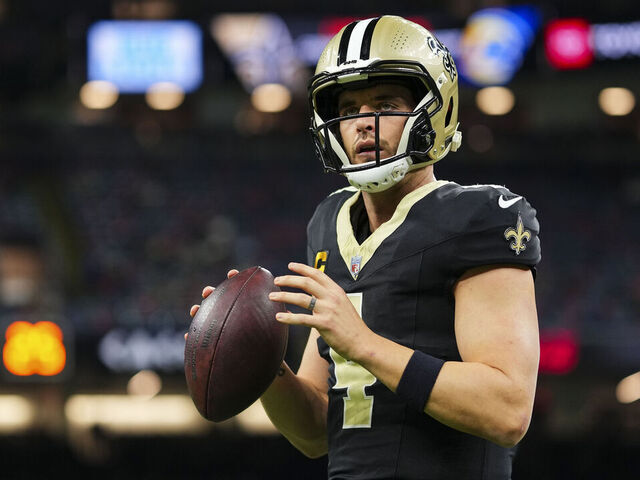 NEW ORLEANS, LA - DECEMBER 01: Derek Carr #4 of the New Orleans Saints warms up prior to an NFL football game against the Los Angeles Rams at Caesars Superdome on December 1, 2024 in New Orleans, Louisiana.