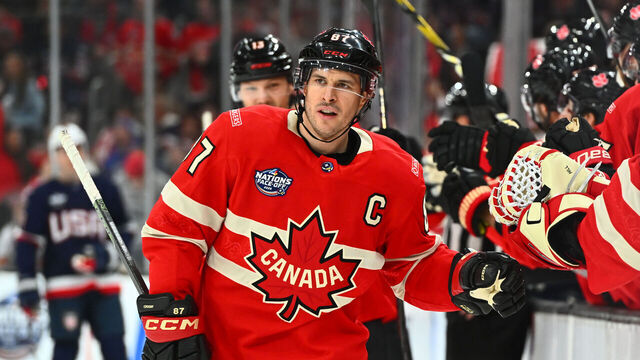BOSTON, MASSACHUSETTS - FEBRUARY 20: Sidney Crosby #87 of Team Canada high-fives his teammates following a Team Canada goal during the first period of the 4 Nations Face-Off Championship game between Team Canada and Team United States at TD Garden on February 20, 2025 in Boston, Massachusetts.
