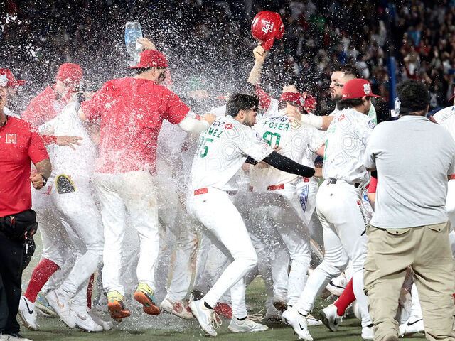 TOPSHOT - Charros de Jalisco's players celebrate after winning the Caribbean Series baseball tournament final game between Mexico's Tomateros de Culiacán and Charros de Jalisco at the Panamerican Stadium in Jalisco, Mexico, on February 8, 2026.