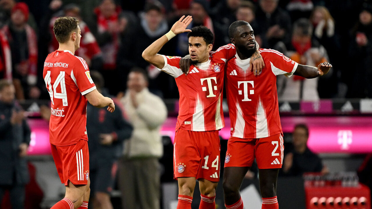 MUNICH, GERMANY - FEBRUARY 08: Luis Diaz of FC Bayern Munich celebrates scoring his team's fifth goal and hat trick with teammate Dayot Upamecano during the Bundesliga match between FC Bayern München and TSG Hoffenheim at Allianz Arena on February 08, 2026 in Munich, Germany.