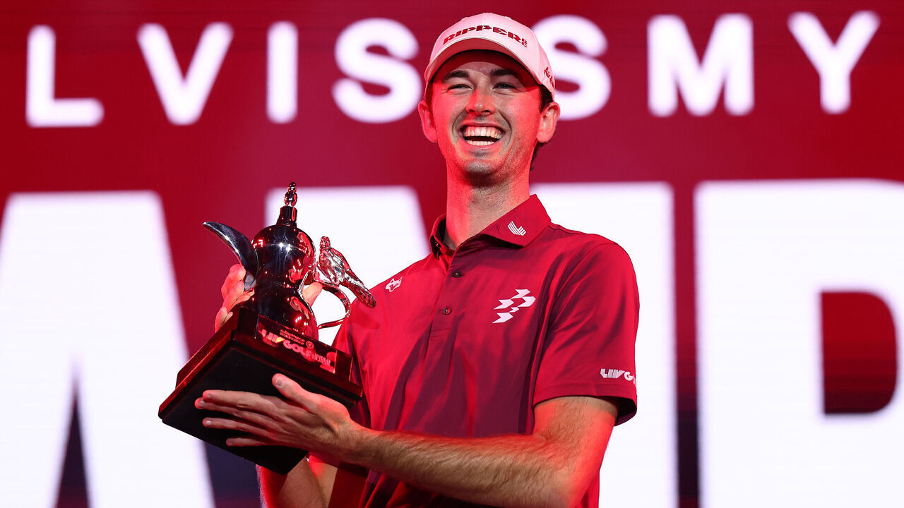 RIYADH, SAUDI ARABIA - FEBRUARY 07: Elvis Smylie of Ripper GC poses for a photo with the trophy after winning the final round on day four of LIV Golf Riyadh at Riyadh Golf Club on February 07, 2026 in Jeddah, Saudi Arabia.