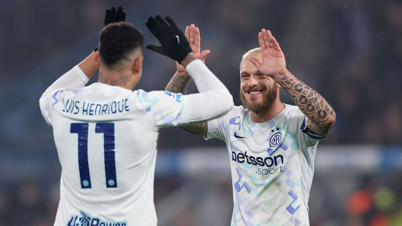 SASSUOLO, ITALY - FEBRUARY 08: Federico Dimarco of FC Internazionale congratulates teammate Luis Henrique on his goal during the Serie A match between US Sassuolo Calcio and FC Internazionale at Mapei Stadium Citta del Tricolore on February 08, 2026 in Sassuolo, Italy.
