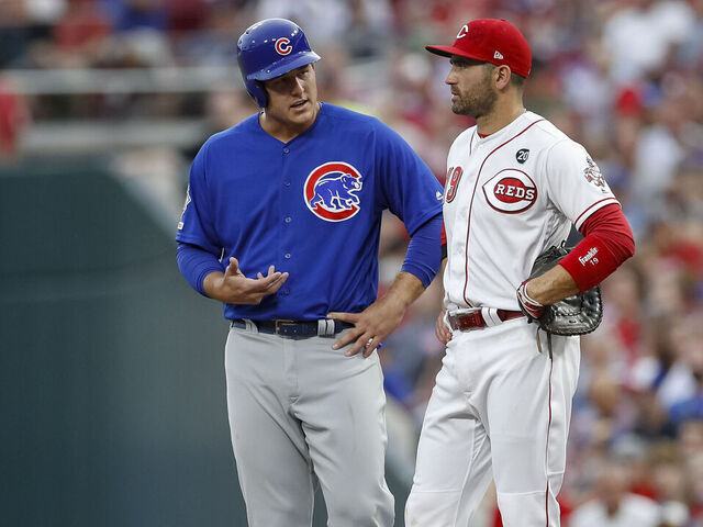 CINCINNATI, OH - AUGUST 08: Anthony Rizzo #44 of the Chicago Cubs talks with Joey Votto #19 of the Cincinnati Reds during the game at Great American Ball Park on August 8, 2019 in Cincinnati, Ohio.