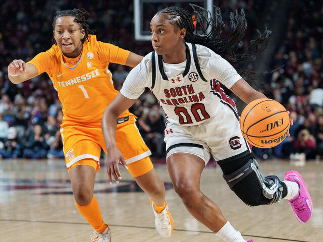 COLUMBIA, SOUTH CAROLINA - FEBRUARY 08: Ta'niya Latson #00 of the South Carolina Gamecocks brings the ball up court while guarded by Nya Robertson #1 of the Tennessee Lady Volunteers in the first half during their game at Colonial Life Arena on February 08, 2026 in Columbia, South Carolina.