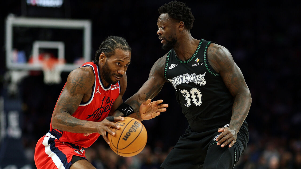MINNEAPOLIS, MINNESOTA - FEBRUARY 08: Kawhi Leonard #2 of the Los Angeles Clippers goes to the basket against Julius Randle #30 of the Minnesota Timberwolves in the first quarter at Target Center on February 08, 2026 in Minneapolis, Minnesota.
