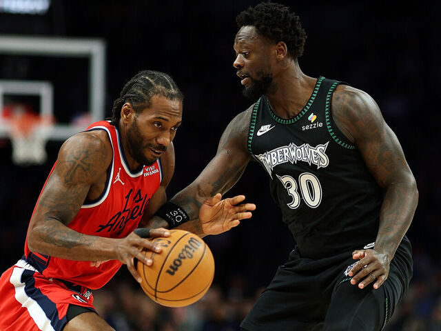 MINNEAPOLIS, MINNESOTA - FEBRUARY 08: Kawhi Leonard #2 of the Los Angeles Clippers goes to the basket against Julius Randle #30 of the Minnesota Timberwolves in the first quarter at Target Center on February 08, 2026 in Minneapolis, Minnesota.