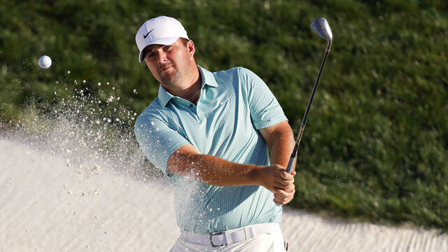 SCOTTSDALE, ARIZONA - FEBRUARY 07: Chris Gotterup of the United States plays a shot from a bunker on the 18th hole during the third round of the WM Phoenix Open 2026 at TPC Scottsdale on February 07, 2026 in Scottsdale, Arizona.