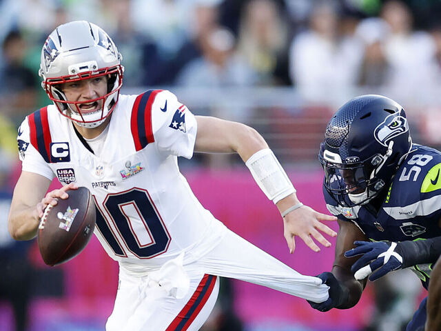 New England Patriots quarterback Drake Maye (10) is sacked by Seattle Seahawks Derick Hall (58) during the first quarter of Super Bowl LX between the Seattle Seahawks and New England Patriots in Santa Clara, Calif. on Sunday, Feb. 8, 2026.