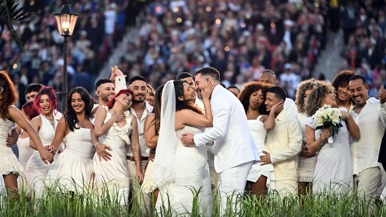 Performers portray a wedding during Puerto Rican singer Bad Bunny performance at Super Bowl LX Patriots vs Seahawks Apple Music Halftime Show at Levi's Stadium in Santa Clara, California on February 8, 2026.