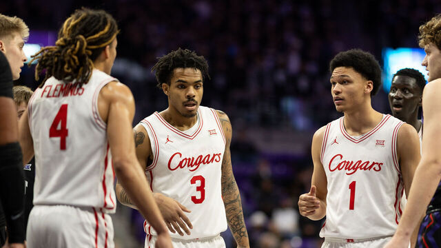 FORT WORTH, TEXAS - JANUARY 28: Ramon Walker Jr. (3), Isiah Harwell (1) of the Houston Cougars huddle during a college basketball game between the TCU Horned Frogs versus the Houston Cougars at Ed and Rae Schollmaier Arena on January 28, 2026 in Fort Worth, Texas.