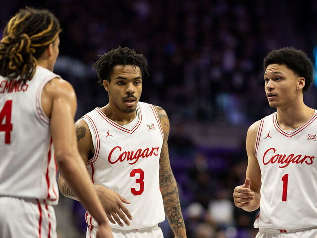 FORT WORTH, TEXAS - JANUARY 28: Ramon Walker Jr. (3), Isiah Harwell (1) of the Houston Cougars huddle during a college basketball game between the TCU Horned Frogs versus the Houston Cougars at Ed and Rae Schollmaier Arena on January 28, 2026 in Fort Worth, Texas.