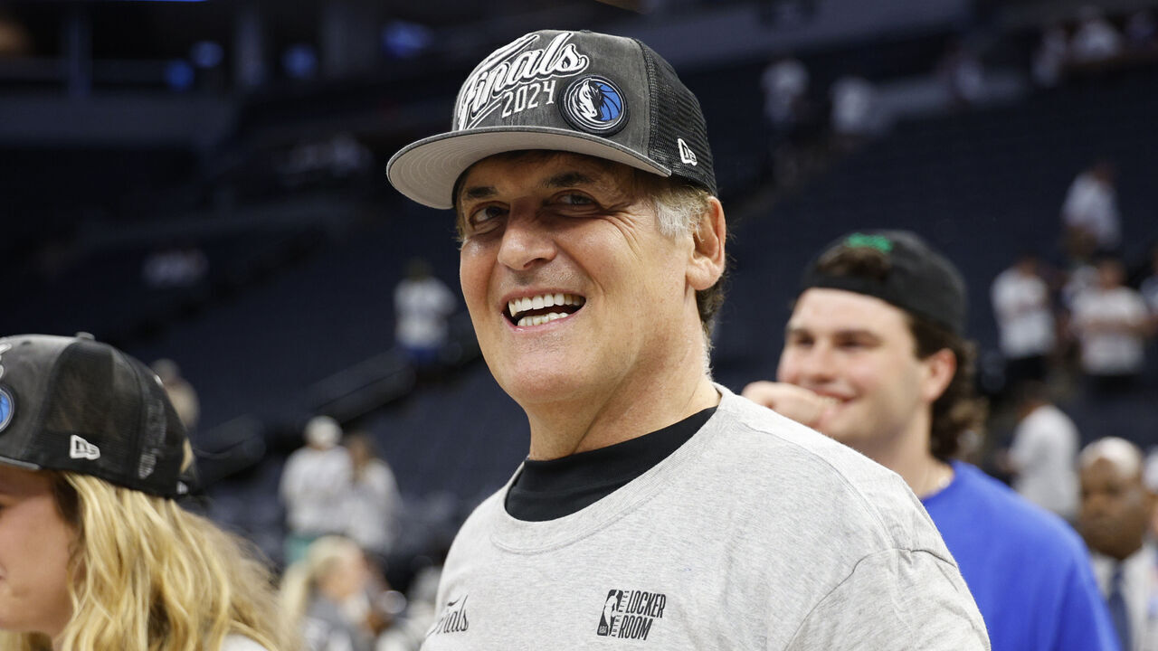 MINNEAPOLIS, MINNESOTA - MAY 30: Dallas Mavericks owner Mark Cuban celebrates after a 124-103 victory against the Minnesota Timberwolves in Game Five of the Western Conference Finals at Target Center on May 30, 2024 in Minneapolis, Minnesota.
