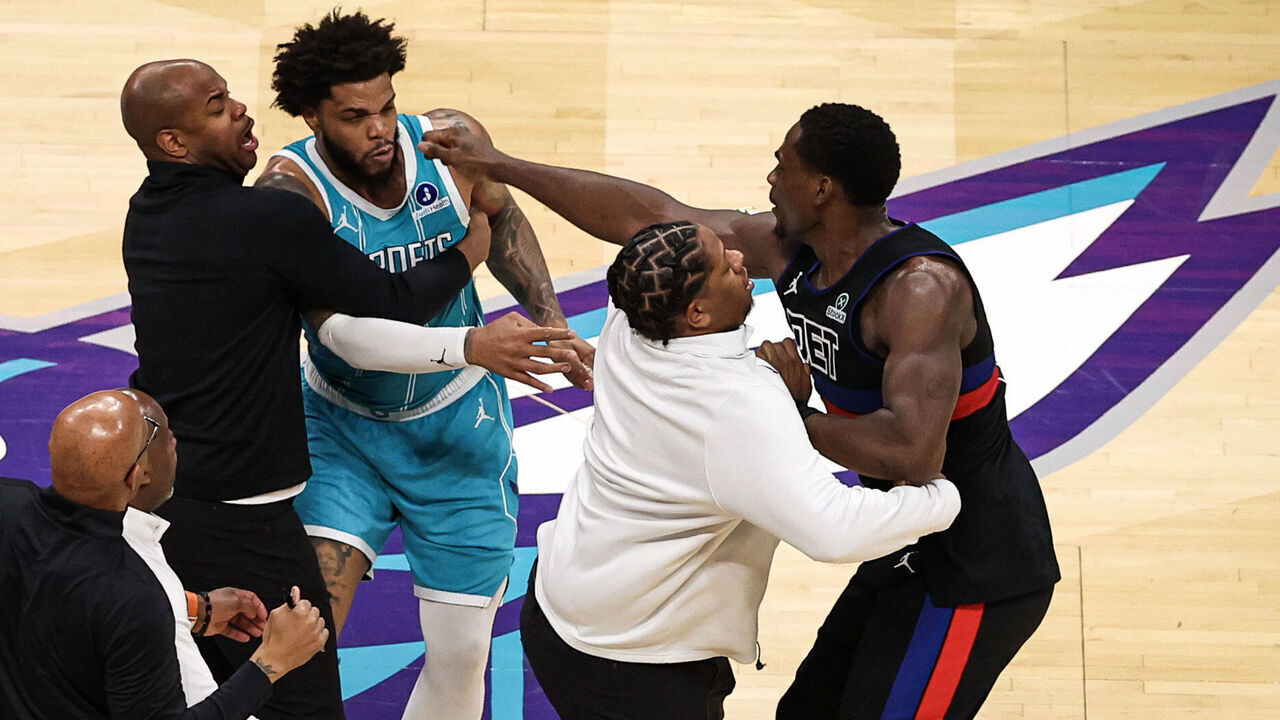 CHARLOTTE, NORTH CAROLINA - FEBRUARY 09: Miles Bridges #0 of the Charlotte Hornets fights Jalen Duren #0 of the Detroit Pistons during the second half of a basketball game at Spectrum Center on February 09, 2026 in Charlotte, North Carolina.