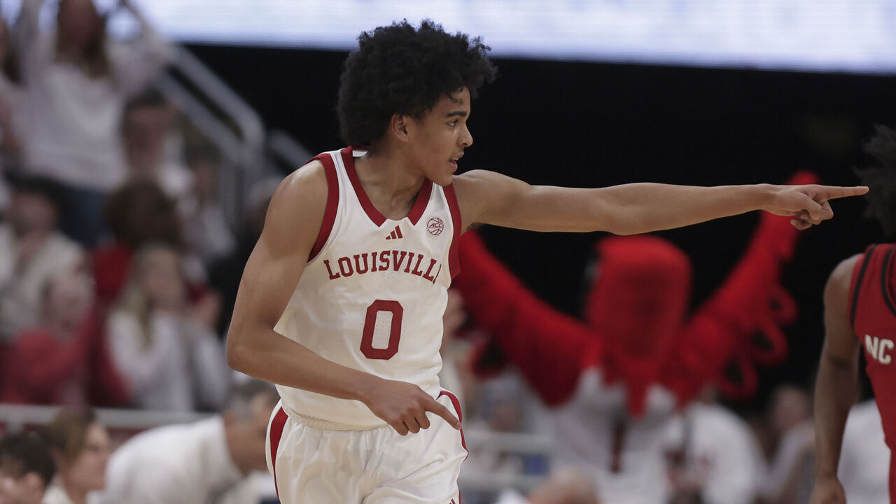 LOUISVILLE, KY - FEBRUARY 09: Louisville Cardinals guard Mikel Brown Jr. (0) acknowledges his team mate in the first half of play during a men's college basketball game between the NC State Wolfpack and the Louisville Cardinals on February 09, 2026 at the KFC Yum! Center in Louisville, KY.