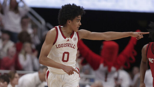 LOUISVILLE, KY - FEBRUARY 09: Louisville Cardinals guard Mikel Brown Jr. (0) acknowledges his team mate in the first half of play during a men's college basketball game between the NC State Wolfpack and the Louisville Cardinals on February 09, 2026 at the KFC Yum! Center in Louisville, KY.