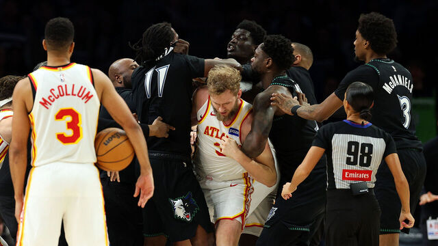 MINNEAPOLIS, MINNESOTA - FEBRUARY 09: Naz Reid #11 of the Minnesota Timberwolves and Mouhamed Gueye #18 of the Atlanta Hawks get into a scrum in the fourth quarter at Target Center on February 09, 2026 in Minneapolis, Minnesota. Reid and Gueye were ejected from the game.