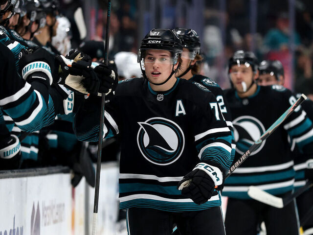 SAN JOSE, CALIFORNIA - NOVEMBER 18: Macklin Celebrini #71 of the San Jose Sharks is congratulated by teammates after he scored his first goal against the Utah Mammoth in the first period at SAP Center on November 18, 2025 in San Jose, California.
