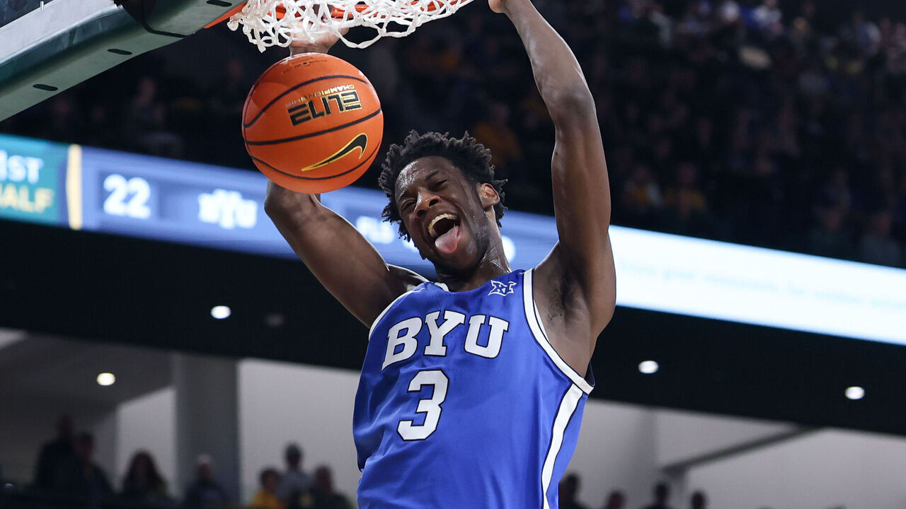 WACO, TX - FEBRUARY 10: Forward AJ Dybantsa #3 of the BYU Cougars dunks the ball as he holds his tongue out of his mouth during the Big 12 college basketball game between Baylor Bears and BYU Cougars on February 10, 2026, at Foster Pavilion in Waco, TX.