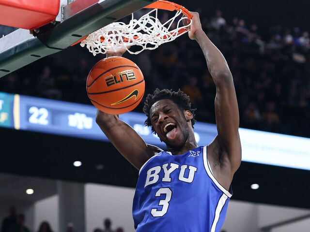 WACO, TX - FEBRUARY 10: Forward AJ Dybantsa #3 of the BYU Cougars dunks the ball as he holds his tongue out of his mouth during the Big 12 college basketball game between Baylor Bears and BYU Cougars on February 10, 2026, at Foster Pavilion in Waco, TX.