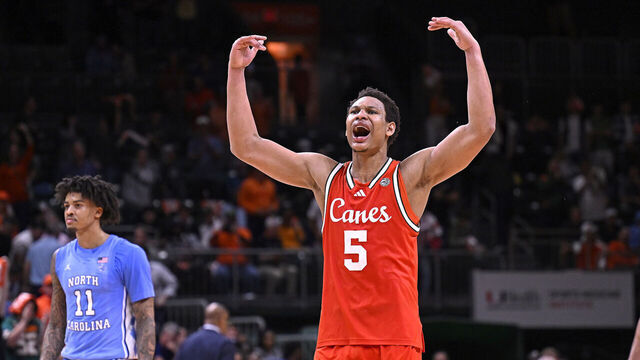 CORAL GABLES, FL - FEBRUARY 10: Miami forward Malik Reneau (5) fires up the crowd late in the second half (also pictured, North Carolina guard Jonathan Powell (11)) as the Miami Hurricanes faced the North Carolina Tar Heels on February 10, 2026, at the Watsco Center in Coral Gables, Florida.