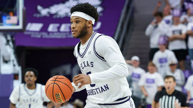 FORT WORTH, TX - FEBRUARY 07: TCU Horned Frogs forward Micah Robinson (#5) dribbles up court during the Big 12 college basketball game between the TCU Horned Frogs and Kansas State Wildcats on February 7, 2026 at Ed & Rae Schollmaier Arena in Fort Worth, Texas.