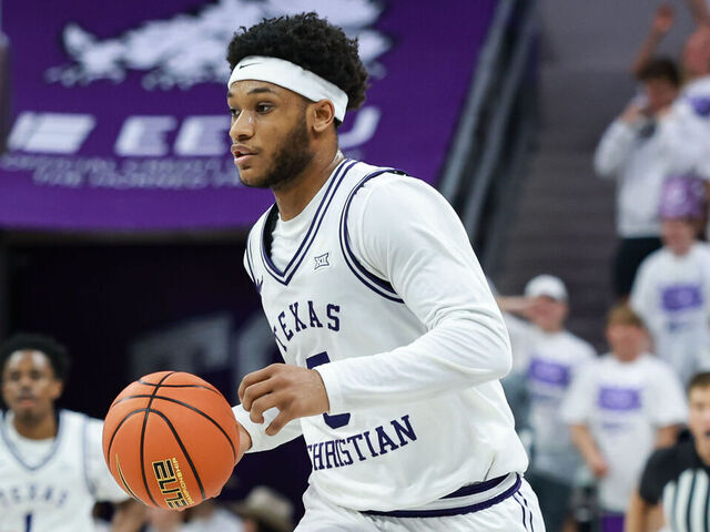 FORT WORTH, TX - FEBRUARY 07: TCU Horned Frogs forward Micah Robinson (#5) dribbles up court during the Big 12 college basketball game between the TCU Horned Frogs and Kansas State Wildcats on February 7, 2026 at Ed & Rae Schollmaier Arena in Fort Worth, Texas.