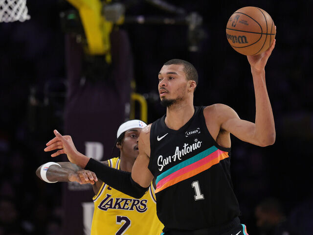 LOS ANGELES, CALIFORNIA - FEBRUARY 10: Victor Wembanyama #1 of the San Antonio Spurs controls the ball against the Los Angeles Lakers in the first half at Crypto.com Arena on February 10, 2026 in Los Angeles, California.