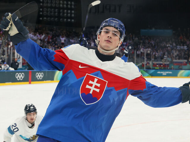 MILAN, ITALY - FEBRUARY 11: Dalibor Dvorsky #15 of Team Slovakia celebrates scoring a goal in the third period during the Men's Preliminary Group B match between Slovakia and Finland on day five of the Milano Cortina 2026 Winter Olympic games at Milano Santagiulia Ice Hockey Arena on February 11, 2026 in Milan, Italy.