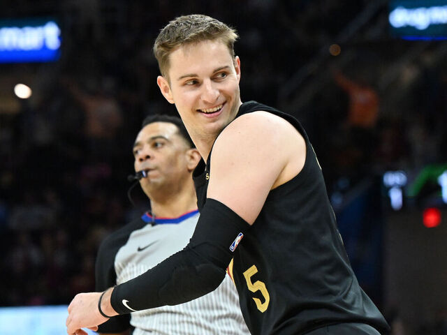 CLEVELAND, OHIO - FEBRUARY 11: Sam Merrill #5 of the Cleveland Cavaliers celebrates after making a three-point basket during the second half against the Washington Wizards at Rocket Arena on February 11, 2026 in Cleveland, Ohio.