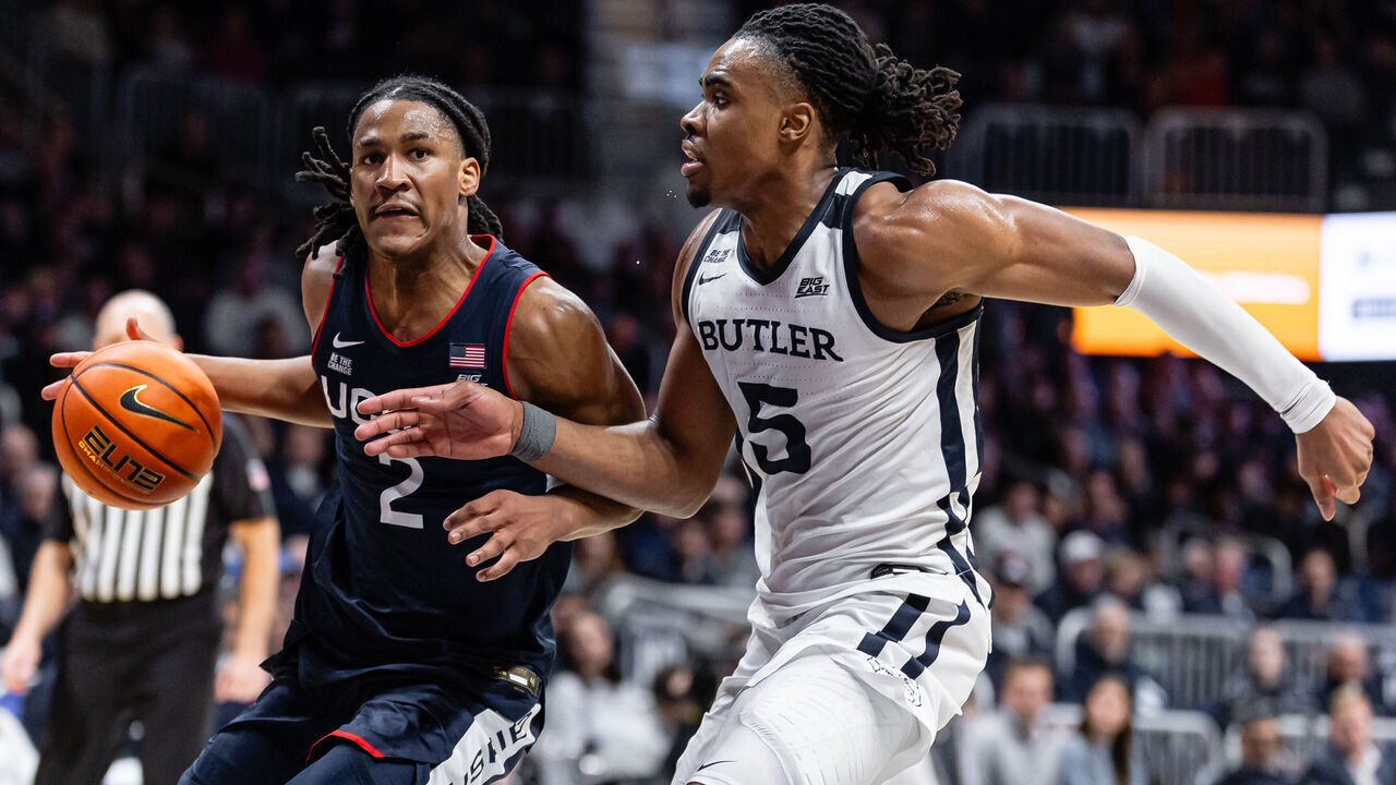 INDIANAPOLIS, INDIANA - FEBRUARY 11: Silas Demary Jr. #2 of the UConn Huskies drives to the basket against Michael Ajayi #5 of the Butler Bulldogs during the second half at Hinkle Fieldhouse on February 11, 2026 in Indianapolis, Indiana.